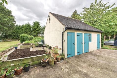 garage and vegetable garden