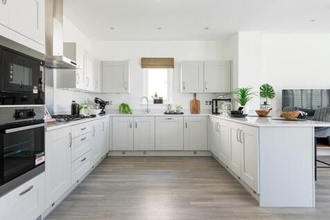 The kitchen offers plenty of space for storage