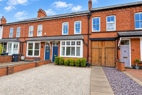 Victorian Terrace with Blue Doors.png