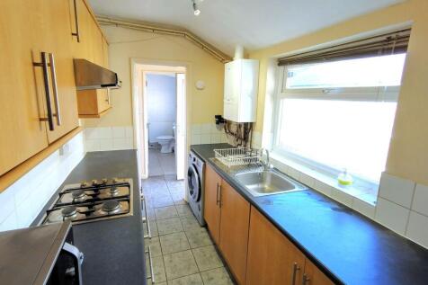 Bright kitchen with ample workspace and storage...