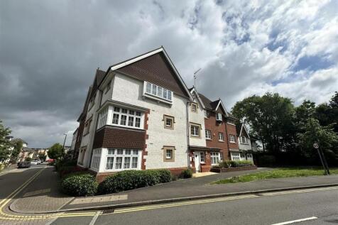 Attractive modern apartment frontage with stree...