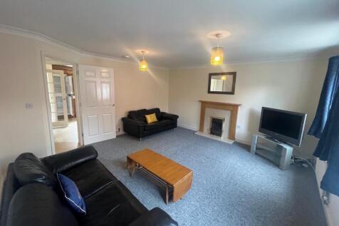Bright, well-presented living room with neutral...