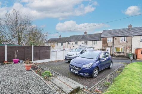 Detached Driveway to the Rear