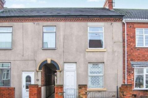 Charming exterior of a classic terraced home...
