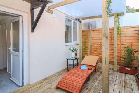 Back garden fully decked and fenced