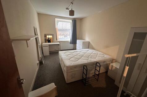 Bright furnished double bedroom with a comforta...