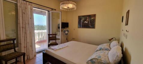 bedroom with balcony