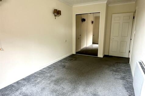 bedroom showing wardrobes