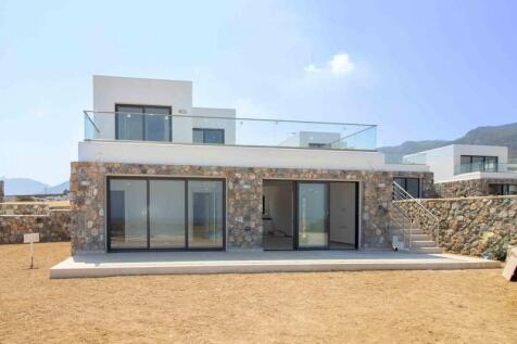 Brand new 3 bedroom contemporary designed resale villa + located on top of a beautiful sandy beach + sea views Image 9999 4