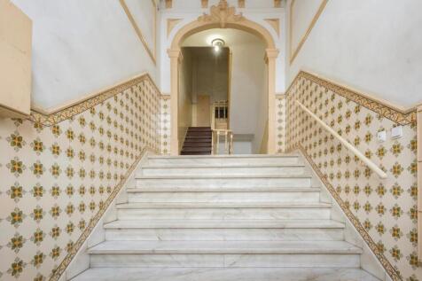 Fully Renovated Three-Suite Apartment with Balcony