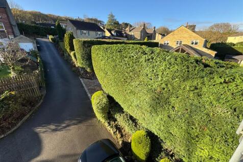 FRONT DRIVE AND GARDEN