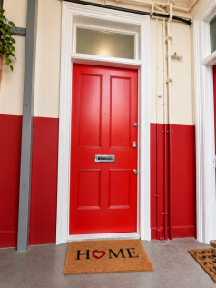 Classic Red Door with Home Mat.png