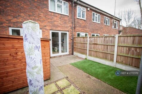 Garden And Shed With Patio Area