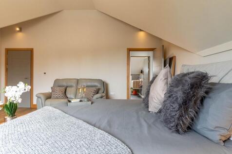 Prinipal Suite suite with dressing area and ensuite