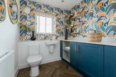 Keep your laundry separate with this convenient cloakroom/utility