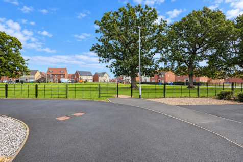 Sunny Suburban Park with Playground.png
