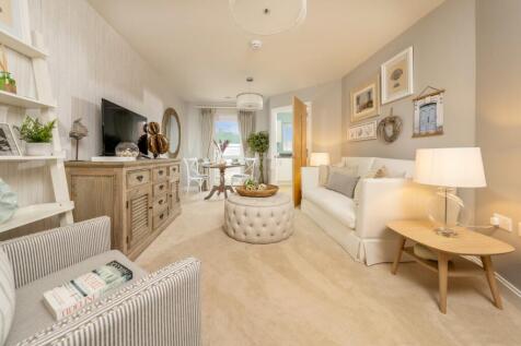 a living room with a couch and a table