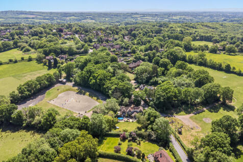 Aerial view of the garden, rear elevation and open countryside all around