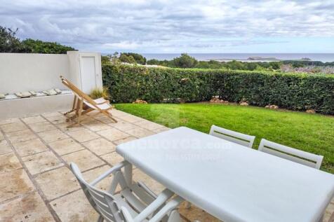 Apartment with sea views and private garden in Coves Noves