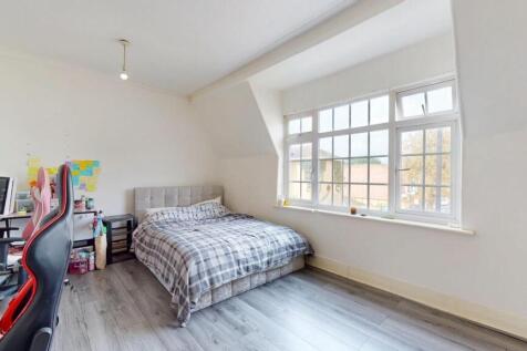 Bright, spacious bedroom with large study desk...