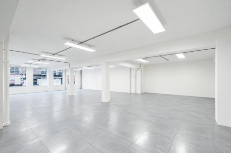 Bright Empty Industrial Loft Interior.png