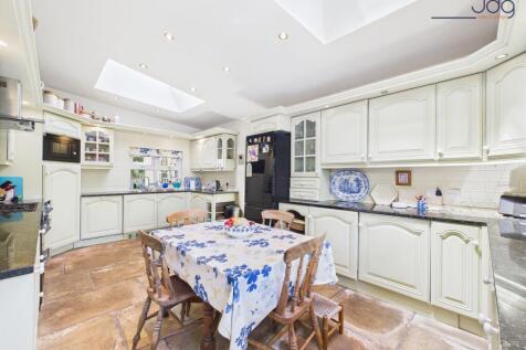 Kitchen with dining space and skylight