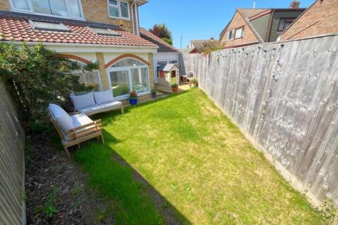 Rear view of property and patio.jpg