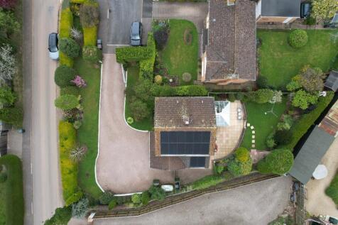 Aerial view of drive, house and garden
