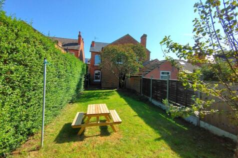 Sunny private garden with picnic seating...