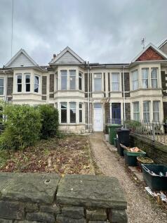 A traditional terraced house with classic bay w...