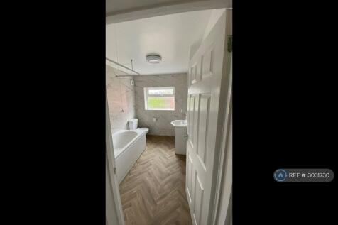 Bathroom. With Electric Shower Above Bath 