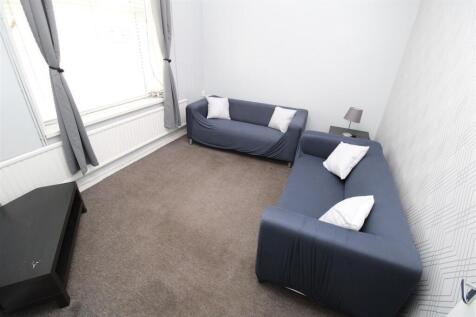 Bright living area with comfortable seating....