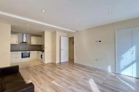 Spacious open-plan living room with modern feel...