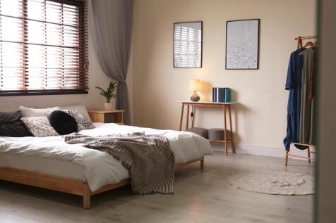 modern-room-interior-with-comfortable-double-bed-a
