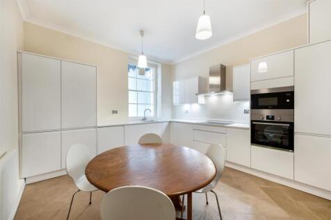 large dining room table in bright kitchen.jpg