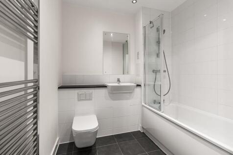 Experience ultimate comfort and style in this modern bathroom oasis.