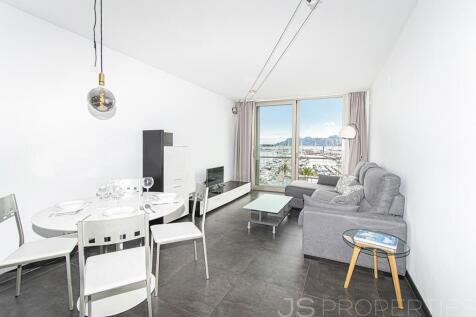 FRONTLINE DUPLEX WITH UNOBSTRUCTED VIEWS OF THE SEA AND MOUNTAINS 