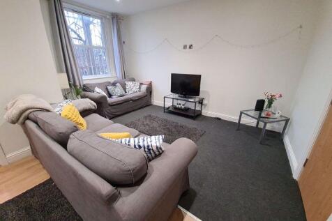 A bright and inviting contemporary living room ...