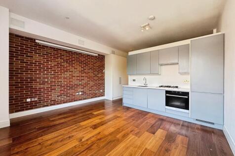 Reception/kitchen/dining area