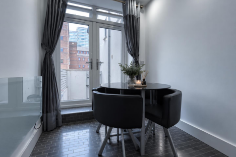 Cool Modern Dining Nook with City Views.png