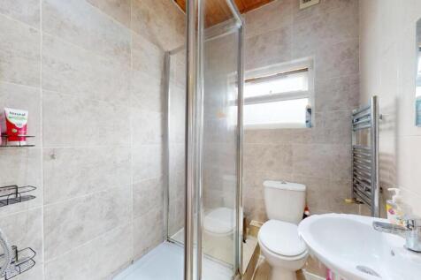 Bright modern bathroom with sleek tiling...