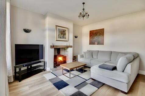 Spacious living room virtually staged