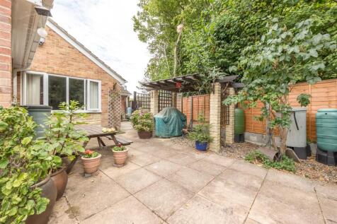 side access leading to double garage
