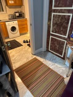 Bright kitchen with modern laundry facilities...