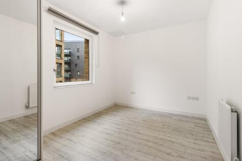 Imagine your perfect haven in this bright, modern room with ample natural light.