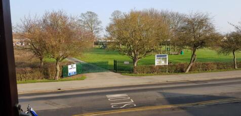 Front view across to Glebe Park