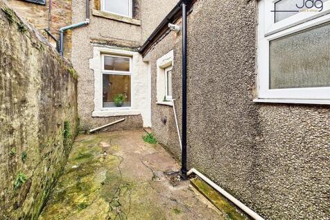 Yard, with rear view of the property