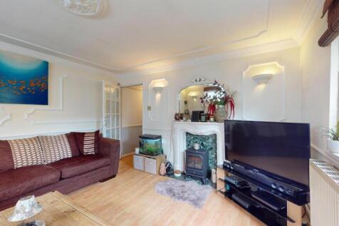 Living room at house for sale at E16, by barrain l
