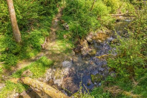 River boundary at bottom of Woodland