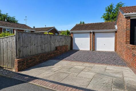 Double garage ( to rear)